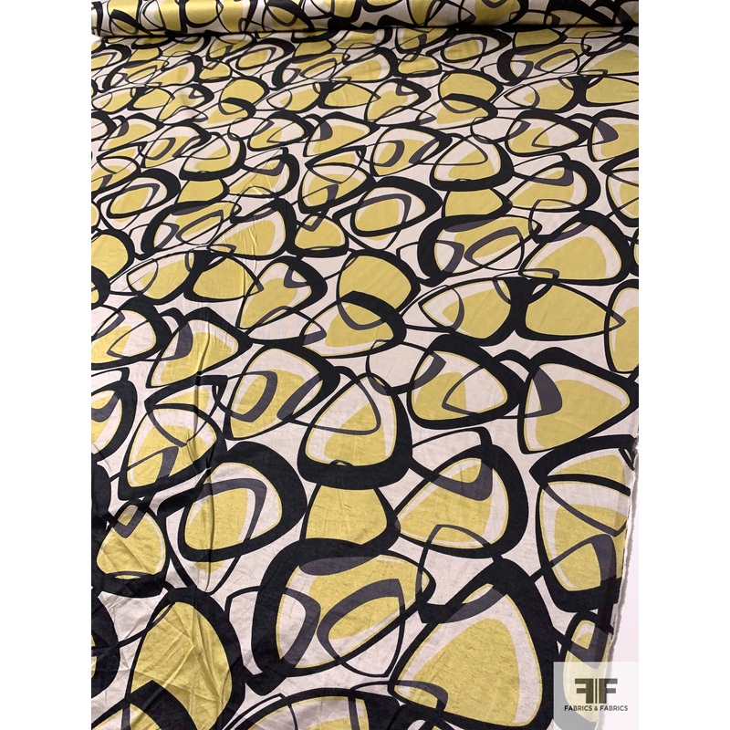 Ringed Triangles Printed Rayon-Poly Satin – Dusty Chartreuse / Black / Sand Fabric by the Yard
