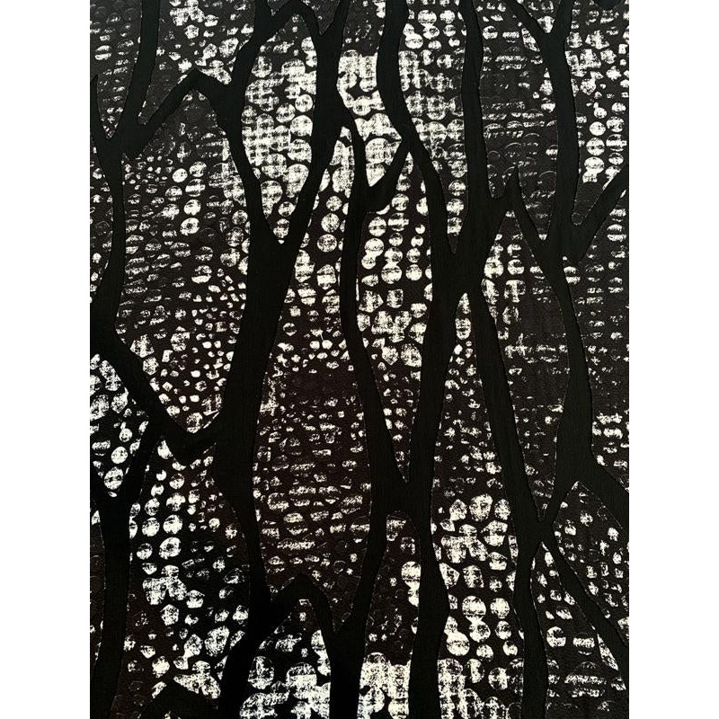 Abstract Printed Partly-Sheer Poly Blend Novelty Knit – Black / White Fabric by the Yard