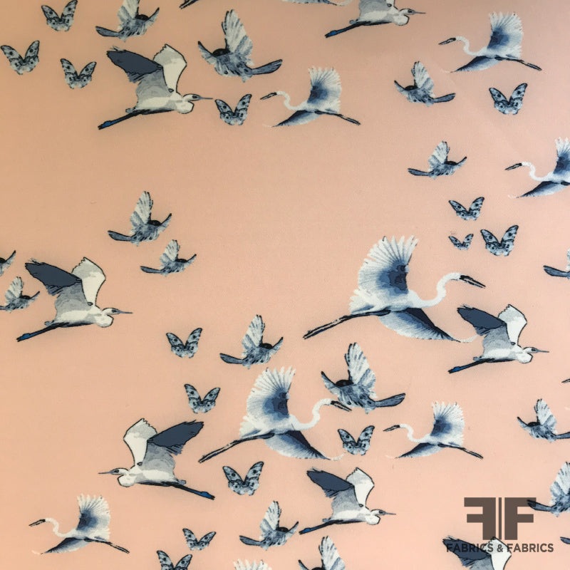 Birds in Flight Stretch Woven Polyester Crepe – Peach/Blue/White Fabric by the Yard