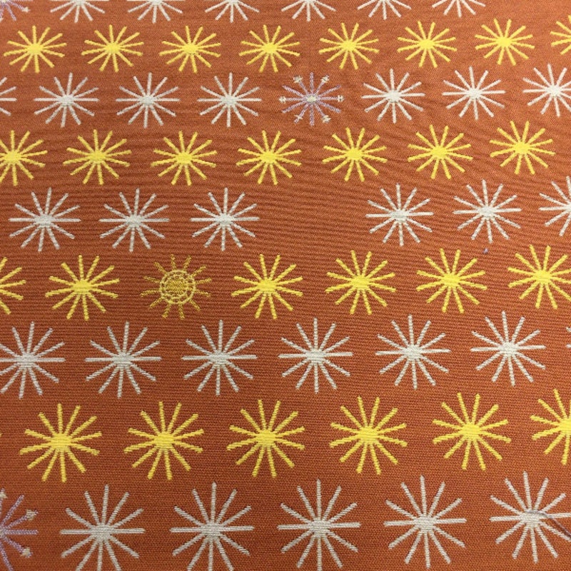 Remnant of Mayer Spokes Sunset Orange Sunbrella Upholstery Fabric Order Product 1