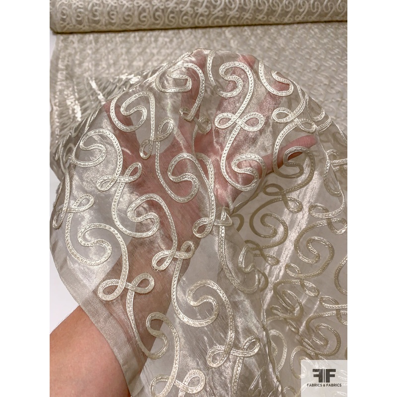 Metallic Silk Organza with Swirl Pattern Ribbon Design – Ivory / Taupe Fabric by the Yard